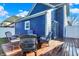 Backyard deck with wicker seating, offering a relaxing outdoor space for gatherings and leisure at 424 N Randolph St, Indianapolis, IN 46201