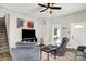 Comfortable living room with cozy seating, ceiling fan, and natural light at 424 N Randolph St, Indianapolis, IN 46201