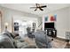 Open-concept living room showcasing the stairs and kitchen at 424 N Randolph St, Indianapolis, IN 46201