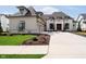 Beautiful home with a long driveway, well manicured lawn, and a two car garage at 4258 Hamilton Run, Zionsville, IN 46077