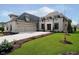 Gorgeous home with a well-maintained lawn and driveway leading to a two car garage at 4258 Hamilton Run, Zionsville, IN 46077