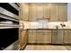 Kitchen featuring stainless appliances, wood floors and granite countertops at 4258 Hamilton Run, Zionsville, IN 46077