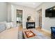 Inviting living room with neutral tones, modern furniture, and hardwood flooring at 4258 Hamilton Run, Zionsville, IN 46077