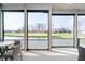 Cozy patio area with table and chairs overlooking water at 4258 Hamilton Run, Zionsville, IN 46077
