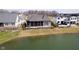 Back exterior view of a house with screened porch at 4258 Hamilton Run, Zionsville, IN 46077