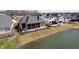 Back exterior view of a house with screened porch at 4258 Hamilton Run, Zionsville, IN 46077