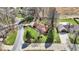 Overhead view of property showcasing manicured lawn, mature trees, and neighborhood at 4263 W Fox Ridge Ave, Greenwood, IN 46143