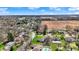 Residential area with well-maintained homes and lawns surrounded by mature trees at 4263 W Fox Ridge Ave, Greenwood, IN 46143