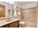 Neutral bathroom featuring a vanity, toilet, and bathtub, for a practical, comfortable space at 4263 W Fox Ridge Ave, Greenwood, IN 46143