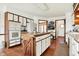 The kitchen features hard wood floors, an island, and lots of counter space at 4263 W Fox Ridge Ave, Greenwood, IN 46143