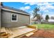 Backyard view showing deck and gray siding at 4721 Ralston Ave, Indianapolis, IN 46205