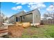 Beautiful home featuring a wooden deck and a gray exterior at 4721 Ralston Ave, Indianapolis, IN 46205