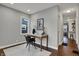 Office space featuring hardwood floors and ample light at 4721 Ralston Ave, Indianapolis, IN 46205