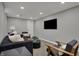 Inviting living room features comfortable seating, a black TV, and recessed lighting for a relaxing ambiance at 4721 Ralston Ave, Indianapolis, IN 46205