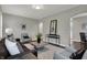 Elegant living room featuring hardwood floors and neutral decor at 4721 Ralston Ave, Indianapolis, IN 46205