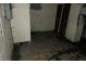 The unfinished basement has cement floors and block walls at 4925 E New York St, Indianapolis, IN 46201