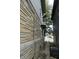 The exterior features brick and siding, side view at 4925 E New York St, Indianapolis, IN 46201