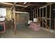 The interior garage is in need of repair and some TLC at 4925 E New York St, Indianapolis, IN 46201