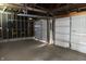 The garage interior has open beams at 4925 E New York St, Indianapolis, IN 46201