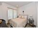 Comfortable bedroom offers neutral tones, and relaxing natural light at 504 N Park Ave # 3, Indianapolis, IN 46202