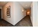 Long hallway with neutral walls, modern lighting, and patterned carpet at 504 N Park Ave # 3, Indianapolis, IN 46202