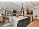 This gorgeous kitchen has a center island with a breakfast bar and adjacent living room at 504 N Park Ave # 3, Indianapolis, IN 46202