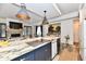 Gourmet kitchen with a large island, stainless steel appliances, and modern cabinetry at 504 N Park Ave # 3, Indianapolis, IN 46202