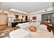 Bright living room showcases an open layout with a cozy sectional sofa and modern kitchen at 504 N Park Ave # 3, Indianapolis, IN 46202