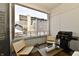 Relaxing outdoor patio area with comfortable seating and a modern grill at 504 N Park Ave # 3, Indianapolis, IN 46202