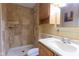 Tiled bathroom features a walk-in shower, a toilet, and vanity with a sink at 535 Butterfly Cir, Greenwood, IN 46142
