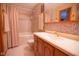 Well-lit bathroom featuring a tub and vanity with ample storage at 535 Butterfly Cir, Greenwood, IN 46142
