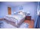 Primary bedroom with a cozy bed and a neutral color scheme at 535 Butterfly Cir, Greenwood, IN 46142