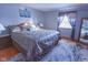 Spacious bedroom features a plush rug and ample lighting at 535 Butterfly Cir, Greenwood, IN 46142
