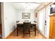 Dining area boasts wood floors and natural light at 535 Butterfly Cir, Greenwood, IN 46142
