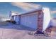 Spacious two car garage with brick accents and seamless driveway approach at 535 Butterfly Cir, Greenwood, IN 46142