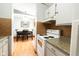 White stove with a view into the dining area at 535 Butterfly Cir, Greenwood, IN 46142