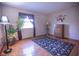 Inviting living room with decorative plants and hard wood floors at 535 Butterfly Cir, Greenwood, IN 46142