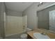 Bathroom featuring a tub/shower combo and vanity at 5406 Shamus Dr, Indianapolis, IN 46235
