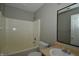 Cozy bathroom with tub and shower combo, complemented by a neutral vanity and well-lit mirror, perfect for daily routines at 5406 Shamus Dr, Indianapolis, IN 46235