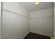 Walk-in closet featuring ample wire shelving and wood floors at 5406 Shamus Dr, Indianapolis, IN 46235