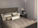 Comfortable bedroom features a neutral color scheme and ample natural light at 561 Prince Dr, Greenwood, IN 46142