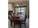 Dining area with modern light fixture and view of the lake at 561 Prince Dr, Greenwood, IN 46142