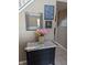 Charming entryway with decorative accents and a beautiful mirror adding style and personality at 561 Prince Dr, Greenwood, IN 46142