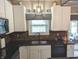 Kitchen boasting stainless steel appliances, granite countertops, and window view at 561 Prince Dr, Greenwood, IN 46142