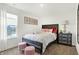 Bedroom featuring a full-sized bed with a view of a lake at 5809 Sunstone Rd, Indianapolis, IN 46239