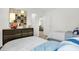Bedroom featuring two beds, a nightstand, and a view of an opened doorway at 5809 Sunstone Rd, Indianapolis, IN 46239