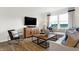 Comfortable living room featuring neutral tones, modern decor, and bright natural light at 5809 Sunstone Rd, Indianapolis, IN 46239