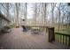Spacious wood deck features outdoor furniture and stainless steel grill at 5918 Camelback Ct, Indianapolis, IN 46250