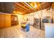 Utility basement with washer, dryer, storage and exposed beams at 5918 Camelback Ct, Indianapolis, IN 46250