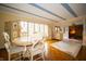 Dining room with hardwood floors and painted details at 5918 Camelback Ct, Indianapolis, IN 46250
